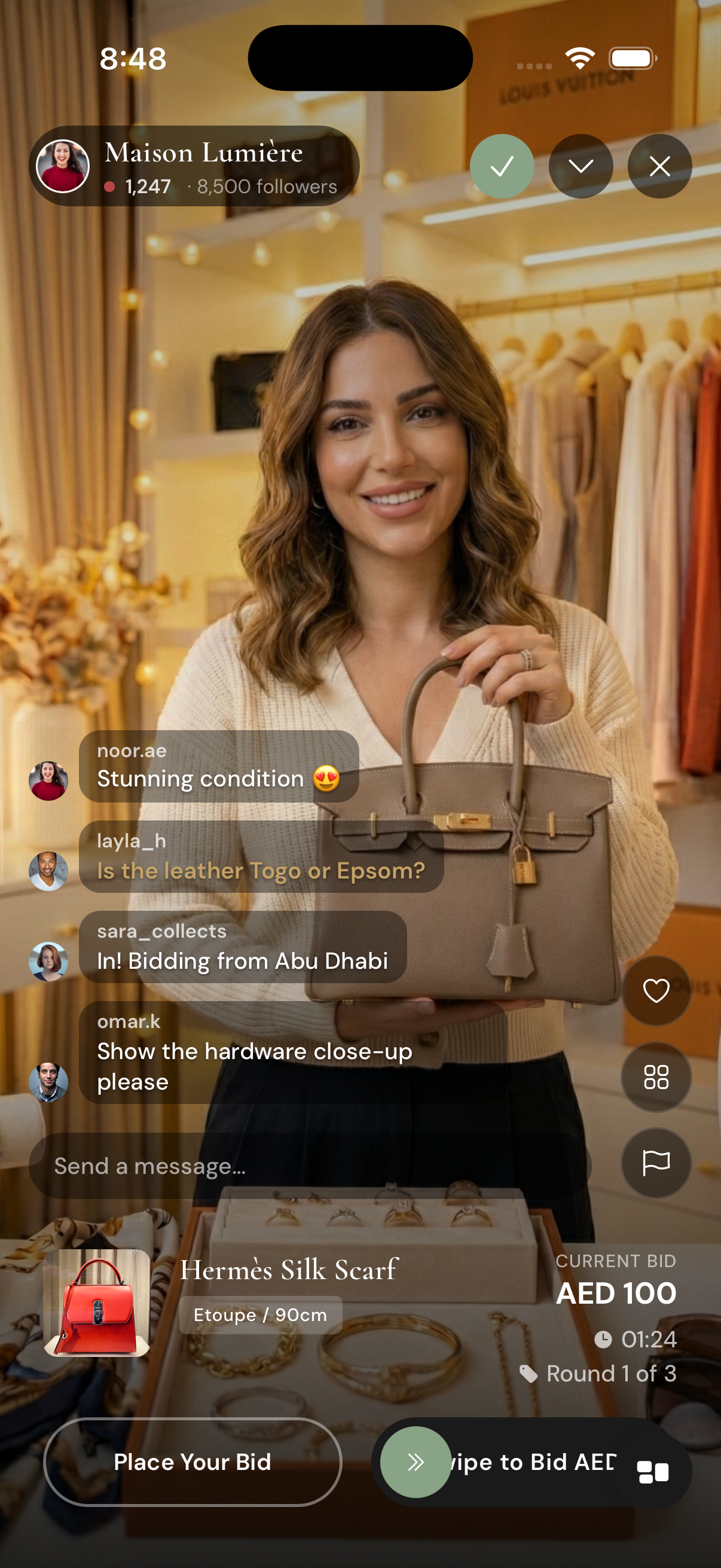 Mine app live auction — Place Your Bid, swipe to bid AED 150